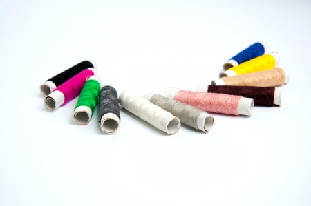 Sewing thread isolated on white backgroundの写真素材