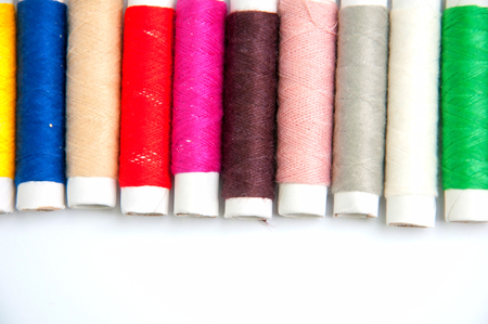 Sewing thread isolated on white backgroundの写真素材