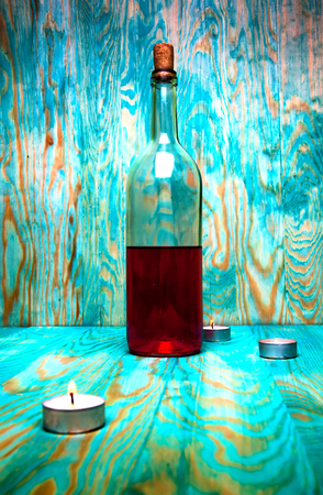 Rose wine closeup on blue wooden backgroundの写真素材