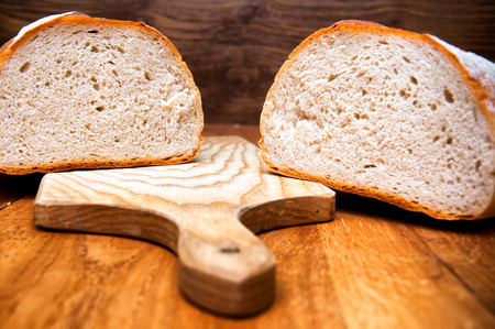 Fresh bread on wooden backgroundの写真素材