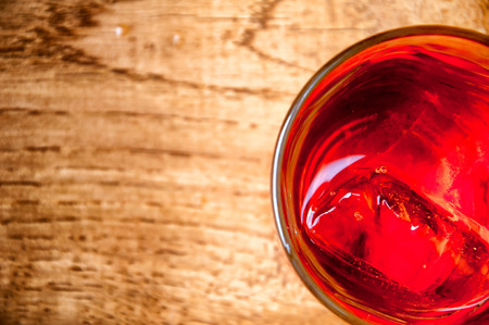 Cold alcohol drink on wooden backgroundの写真素材