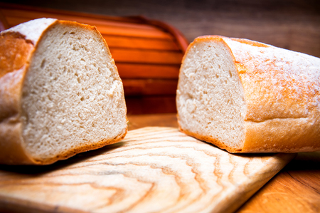 Fresh bread on wooden backgroundの写真素材