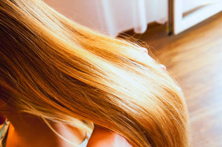 Long blonde hair of young girlの写真素材