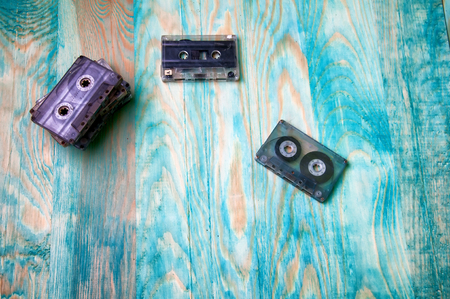 Old music audio tapes on blue backgroundの写真素材