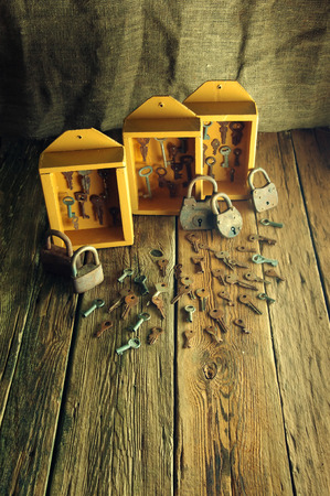 Boxes with old keys and padlocksの写真素材