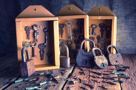 Boxes with old keys and padlocksの写真素材