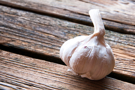 Garlic on wooden backgroundの写真素材
