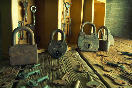 Boxes with old keys and padlocksの写真素材