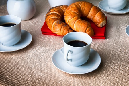 Coffee and croissant for breakfastの写真素材