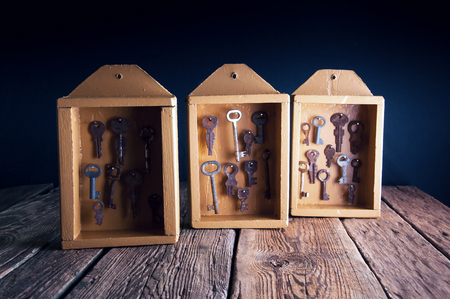 Boxes with old keys for hotel roomsの写真素材