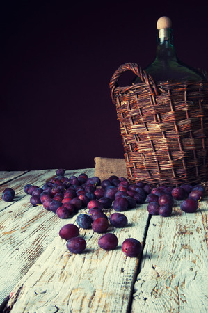 Jug of homemade plum alcoholの写真素材