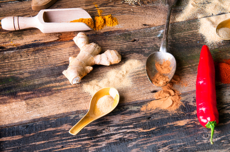 Colorful aromatic spices in old rustic kitchenの写真素材