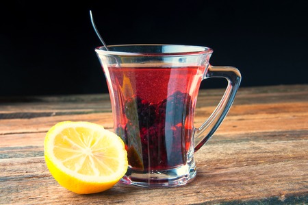 Warming drink with berries and honeyの写真素材