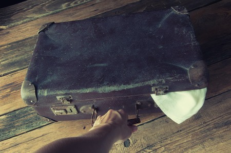 Girl pulling a suitcaseの写真素材