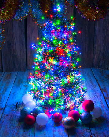 Christmas tree with lights and decorationsの写真素材