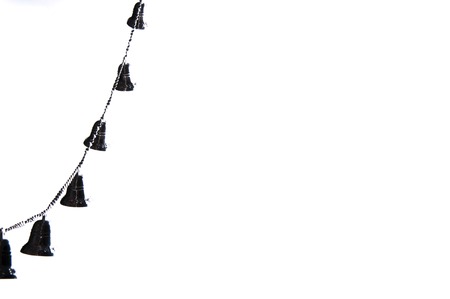 Christmas tree chain with bells isolated on white backgroundの写真素材