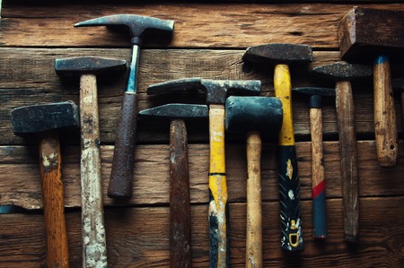 Many old hammers in carpenter's workshopの写真素材