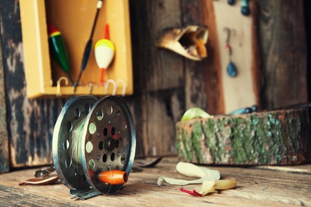 Fishing equipment on vintage wooden backgroundの写真素材