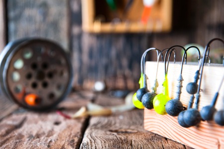 Fishing equipment on vintage wooden backgroundの写真素材