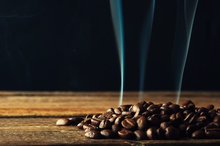 Smoke over roasted coffee beansの写真素材
