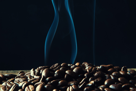 Smoke over roasted coffee beansの写真素材