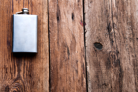 Metal silver hip-flask, copyspaceの写真素材