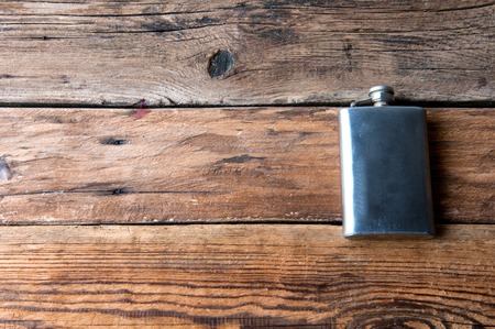 Metal silver hip-flask, copyspaceの写真素材