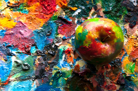 Oil painted apple on colorful background. Abstract. Copyspaceの写真素材