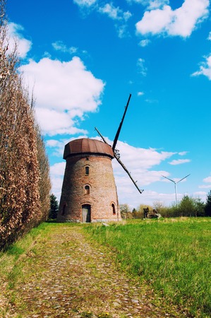 Old windmill on countryの写真素材