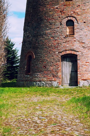 Old windmill on countryの写真素材