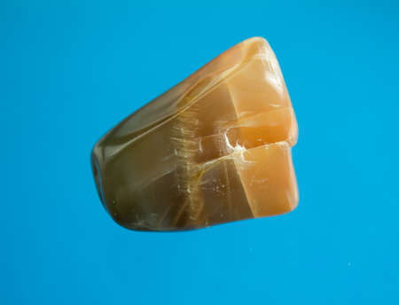 A moonstone which looks like caramel and coffee.の写真素材