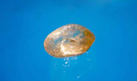 Citrine is a variety of quartz whose color ranges from a pale yellow to brown due to ferric impurities.の写真素材