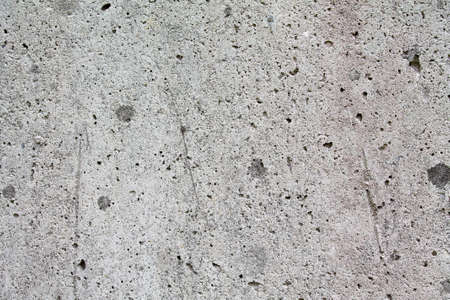 Texture of a dirty concrete wall with signs of age.の写真素材