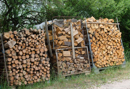 Firewood piled up ready to be picked up as texture