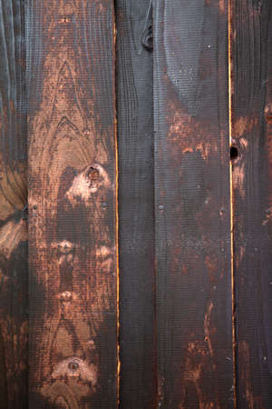Texture of an old brown wooden wall. The slats are installed horizontally.の写真素材