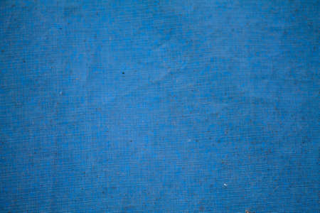 Texture of a blue tarpaulin.の写真素材