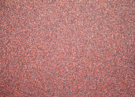 Coarse emery paper texture. In a red purple version.の写真素材