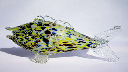 A very colorful fish made of glass. Mouth blown from Murano.の写真素材