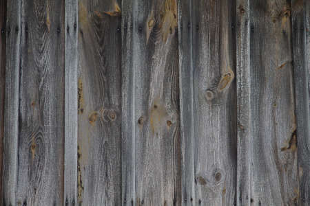 Texture old wooden wall. Washed and faded old wood.の写真素材