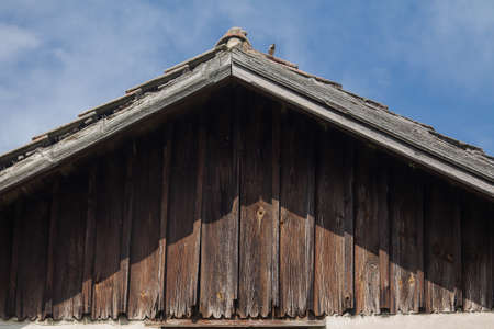 Old house with a lot of wood. Marked by decay.の写真素材