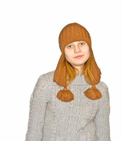 winter clad girl  red cap, pink gloves and silver sweater