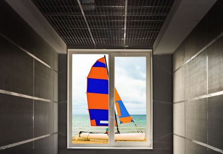 View on a beach with a boatの写真素材