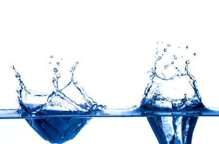 Water drop with shallow depth of field isolated on white backgroundの写真素材