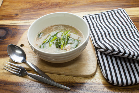 Fried noodle in Gravy on wooden backgroundの写真素材