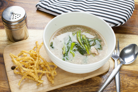 Fried noodle in Gravy on wooden backgroundの写真素材