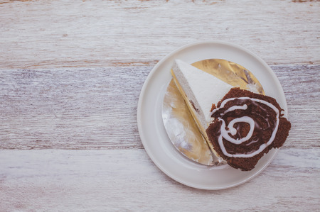 Brownie cheese Cake on wooden plank backgroundの写真素材