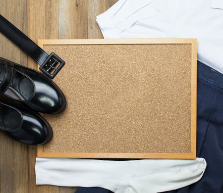 Still life : Thai Student girl uniform with wooden background on top viewの写真素材