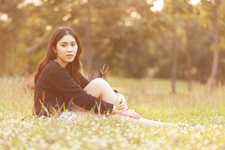 Pretty Thai girl at the parkの写真素材