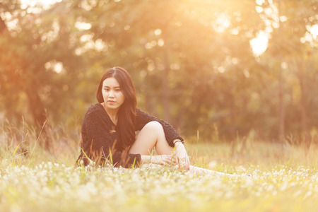 Pretty Thai girl Smiling at the parkの写真素材