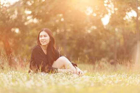 Pretty Thai girl Smiling at the parkの写真素材